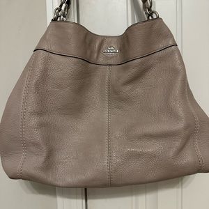 Coach Handbag
Lexy Shoulder Bag in Saddle 2 Pebble Leather. K1879-F28997